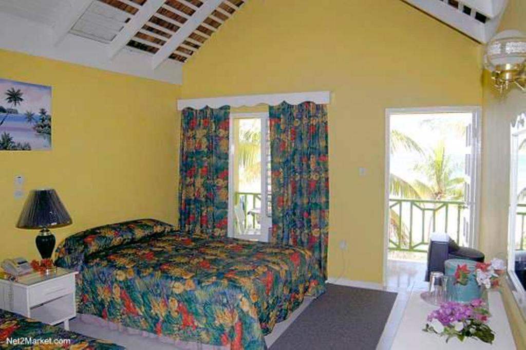 Our Past Time Hotel نيغريل الغرفة الصورة